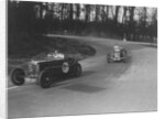 Two Frazer-Nash cars racing at Donington Park, Leicestershire, 1930s by Bill Brunell