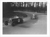 Two Frazer-Nash cars racing at Donington Park, Leicestershire, 1930s by Bill Brunell