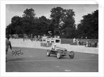 Alfa Romeo of Kenneth Evans taking the chequered flag at Crystal Palace, 1939 by Bill Brunell