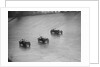 Two Austin 7s and an unidentified car racing at a BARC meeting, Brooklands, Surrey, 1931 by Bill Brunell