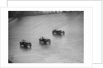 Two Austin 7s and an unidentified car racing at a BARC meeting, Brooklands, Surrey, 1931 by Bill Brunell
