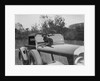 Dachshund sitting on the bonnet of Charles Mortimer's Bentley, c1930s by Bill Brunell