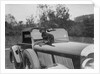 Dachshund sitting on the bonnet of Charles Mortimer's Bentley, c1930s by Bill Brunell