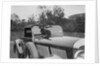 Dachshund sitting on the bonnet of Charles Mortimer's Bentley, c1930s by Bill Brunell