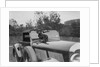 Dachshund sitting on the bonnet of Charles Mortimer's Bentley, c1930s by Bill Brunell