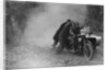 Motorcycle and sidecar receiving a push during a trial, c1930s by Bill Brunell