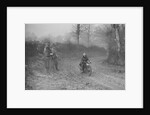 Woman riding a Royal Enfield motorcycle in the Gloucester Trial, c1930s by Bill Brunell