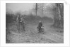 Woman riding a Royal Enfield motorcycle in the Gloucester Trial, c1930s by Bill Brunell