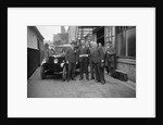 Group of men with a Triumph Super Seven, c1930(?) by Bill Brunell
