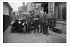 Group of men with a Triumph Super Seven, c1930(?) by Bill Brunell
