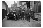 Group of men with a Triumph Super Seven, c1930(?) by Bill Brunell