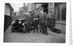 Group of men with a Triumph Super Seven, c1930(?) by Bill Brunell