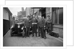 Group of men with a Triumph Super Seven, c1930(?) by Bill Brunell