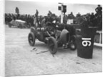 Leon Cushman working on his Bugatti Brescia at the JCC 200 Mile Race, Brooklands, Surrey, 1922 by Bill Brunell