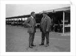 Two men chatting at Brooklands motor racing circuit, Surrey, 1920s by Bill Brunell