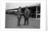 Two men chatting at Brooklands motor racing circuit, Surrey, 1920s by Bill Brunell