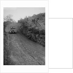 Kitty Brunell driving a 1930 2-seater Ford Model A, 1931. by Bill Brunell