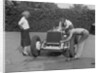 Working on the engine of Raymond Mays' Vauxhall-Villiers, c1930s by Bill Brunell