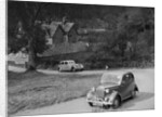Vauxhall 10 of Miss IM Burton amd Rover of CG Dunham competing in the RAC Rally, 1939 by Bill Brunell