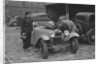 AES Curtis looking under the bonnet of his HRG at the RAC Rally, 1939 by Bill Brunell