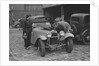 AES Curtis looking under the bonnet of his HRG at the RAC Rally, 1939 by Bill Brunell