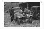 AES Curtis looking under the bonnet of his HRG at the RAC Rally, 1939 by Bill Brunell