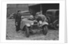AES Curtis looking under the bonnet of his HRG at the RAC Rally, 1939 by Bill Brunell