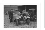 AES Curtis looking under the bonnet of his HRG at the RAC Rally, 1939 by Bill Brunell