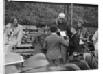 Goldie Gardner signing autographs at the Irish Grand Prix, Phoenix Park, Dublin, 1930 by Bill Brunell