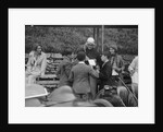 Goldie Gardner signing autographs at the Irish Grand Prix, Phoenix Park, Dublin, 1930 by Bill Brunell