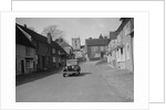 Standard Sixteen saloon driving down the High Street, Hambledon, Hampshire, 1930s by Bill Brunell