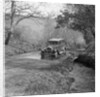 Singer Super Six driving through a ford at Croydon Hill, near Timberscombe, Somerset, 1930s by Bill Brunell