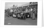 Three MG C type Midgets in the pits at the RAC TT Race, Ards Circuit, Belfast, 1932 by Bill Brunell