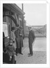 Group of people outside a Metropolitan Line railway station, London, 1930s. by Bill Brunell