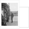 Group of people outside a Metropolitan Line railway station, London, 1930s. by Bill Brunell