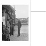 Group of people outside a Metropolitan Line railway station, London, 1930s. by Bill Brunell