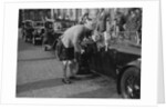 Kitty Brunell in her Aston Martin, chatting to a man in Highland dress, RSAC Scottish Rally, 1933 by Bill Brunell