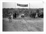 Austin Swallow of Mrs A Stanley at the finish of the Middlesex County AC Hill Climb, c1930 by Bill Brunell