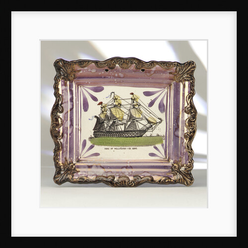 Purple lustre wall plaque by unknown