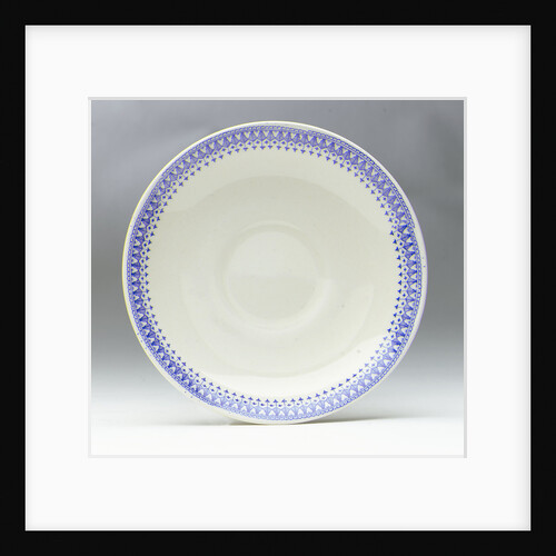 Earthenware saucer by unknown