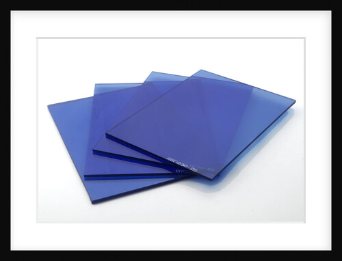 Four plates of blue glass by unknown