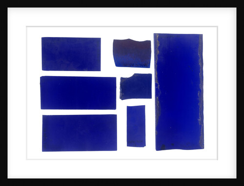 Seven pieces of cobalt blue pieces of glass in a bag by unknown