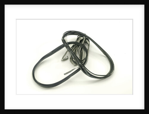 Four strips of magnesium ribbon in a bag by unknown