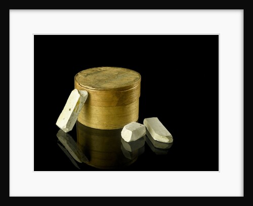 Pill box containing eight chalky plaster like crystals by unknown
