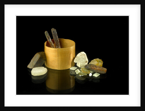 Pill box without a lid containing crystals by unknown