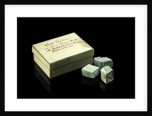 Box of six turquoise blue opaque crystals by unknown