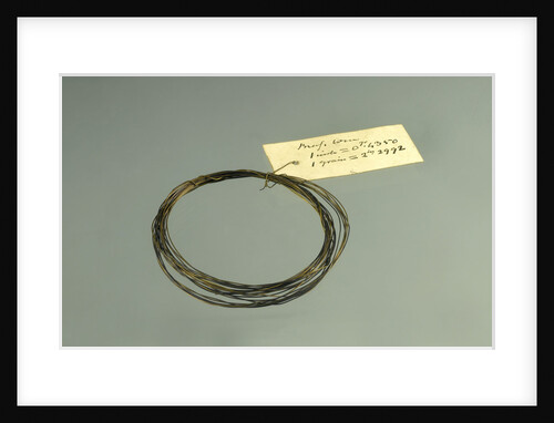 Roll of brass wire in a bag by unknown
