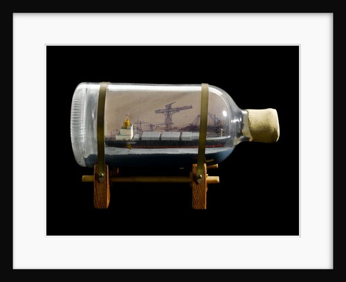 A bottle containing a model ship by unknown