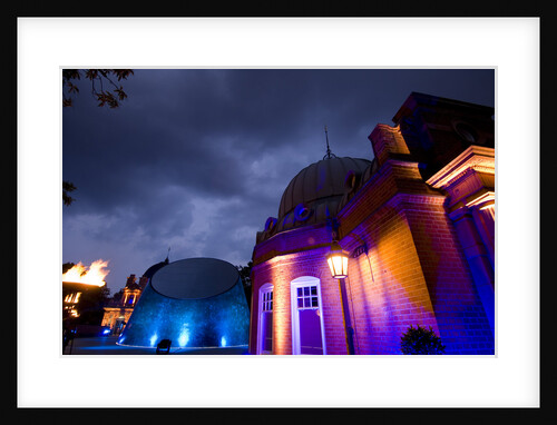 Night-time view of illuminated Royal Observatory, Greenwich, including the Peter Harrison Planetarium, Astronomy Centre (South Building) and Altazimuth Building by National Maritime Museum