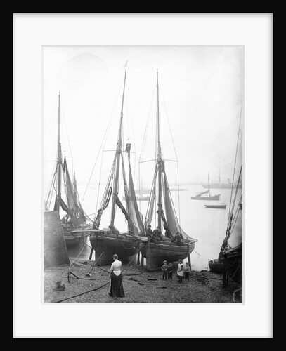 View across River Thames with fishing bawleys drawn up onto the foreshore. Gravesend, Kent by unknown